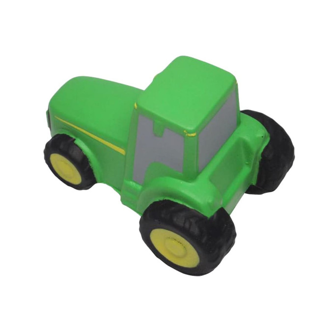 A green tractor-shaped stress reliever with yellow wheels and grey details. It features a logo on its surface.