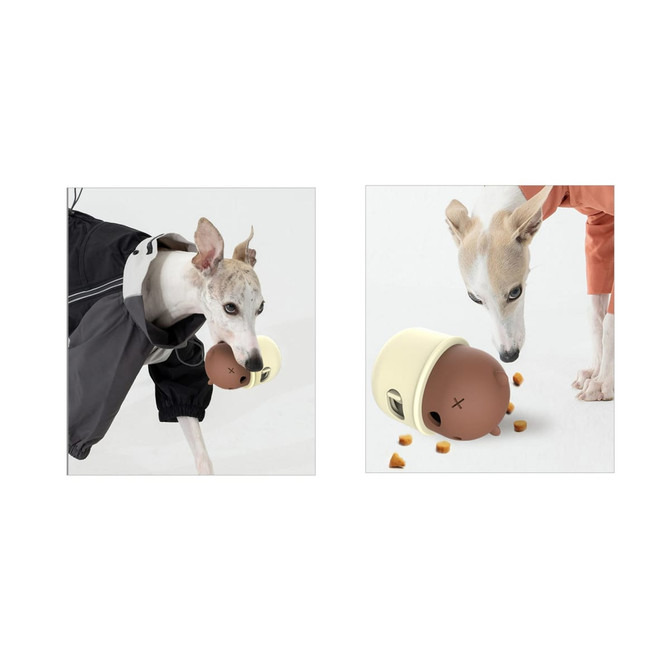 A dog toy in cream and brown, shaped like a dispenser, with treats scattered nearby. It has a logo on it.