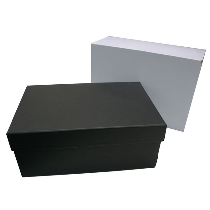 Two rectangular gift boxes are displayed, one in black and the other in white, both with a simple design.
