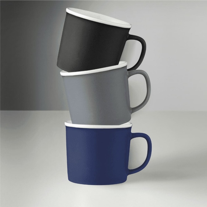 Three ceramic mugs in black, grey, and navy stacked with white interiors, featuring a logo on the side.