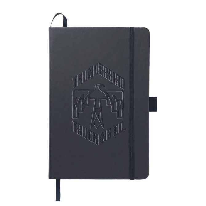 A dark blue A5 notebook with a textured cover and an embossed logo. It features an elastic band and ribbon bookmark.