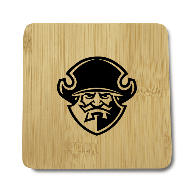 A square bamboo coaster featuring a black pirate emblem on a light bamboo background.