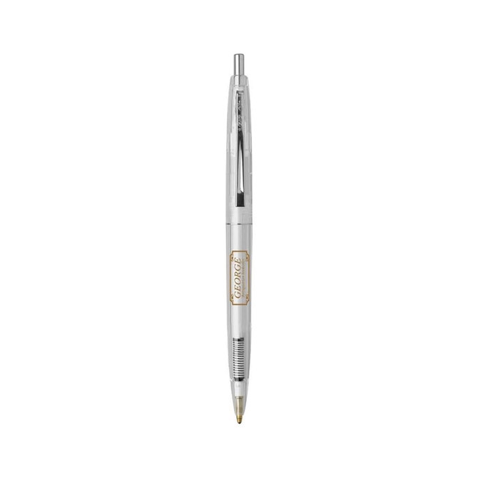 A clear plastic pen with a gold trim and a click mechanism, featuring a logo on the barrel.