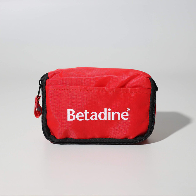 A red first aid travel kit with a zip closure and a logo on the front. Contains 13 essential first aid items.