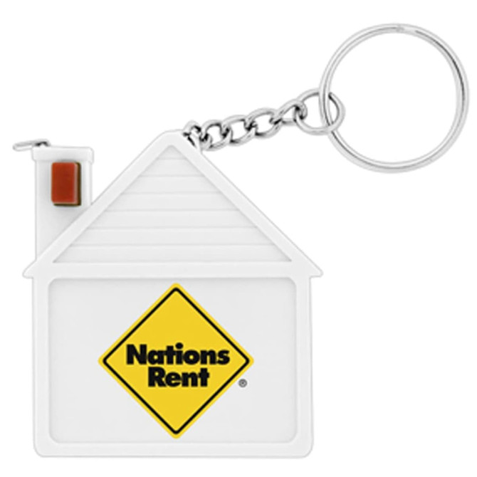 A house-shaped keychain featuring a chain and an attached logo, predominantly white with a yellow and black design.