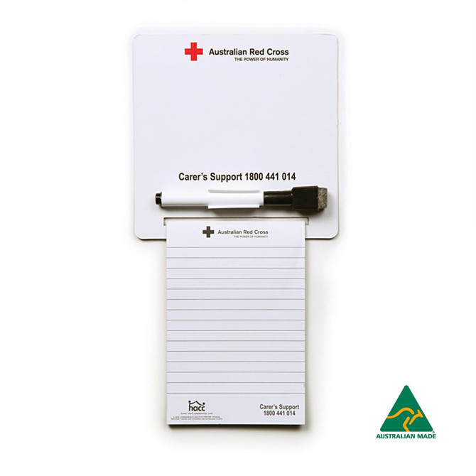 A magnetic whiteboard notepad in white, featuring a clip-on pen and an Australian Red Cross logo.