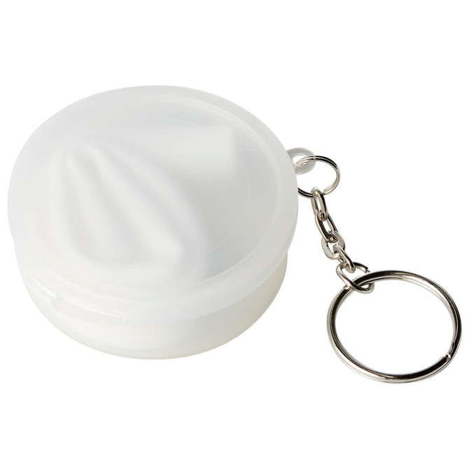 A white, reusable silicone straw stored in a round carrying case with a keychain attachment.