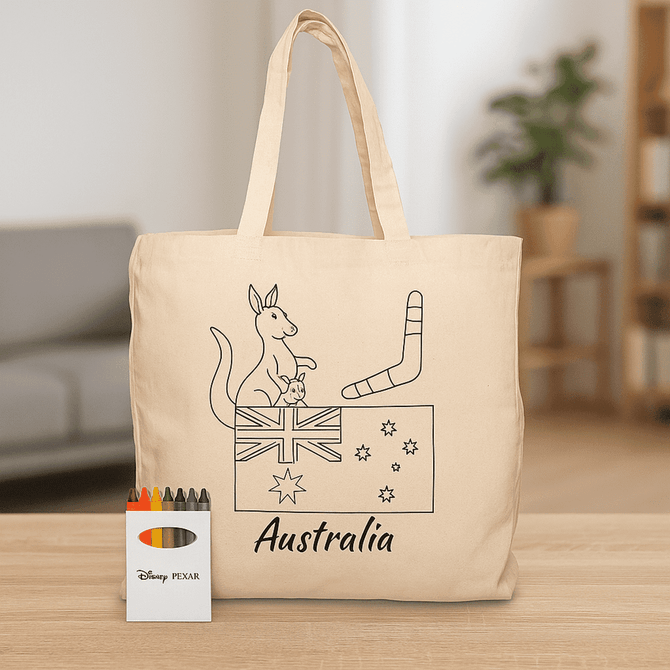 A beige tote bag featuring an illustration of a kangaroo and Australian symbols, accompanied by a crayon set.