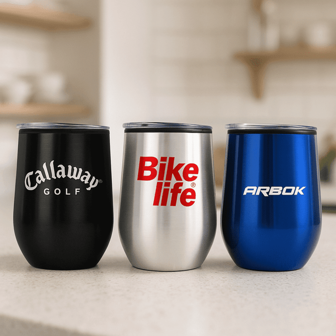 A drink bottle set featuring three insulated cups in black, silver, and blue, each with a different logo.