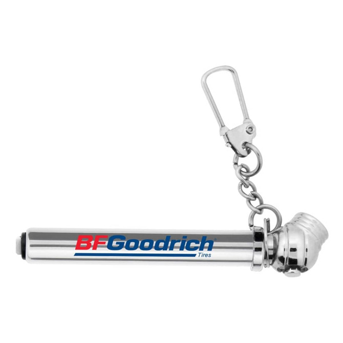 A silver key chain tyre gauge with a clip attachment, featuring a logo.