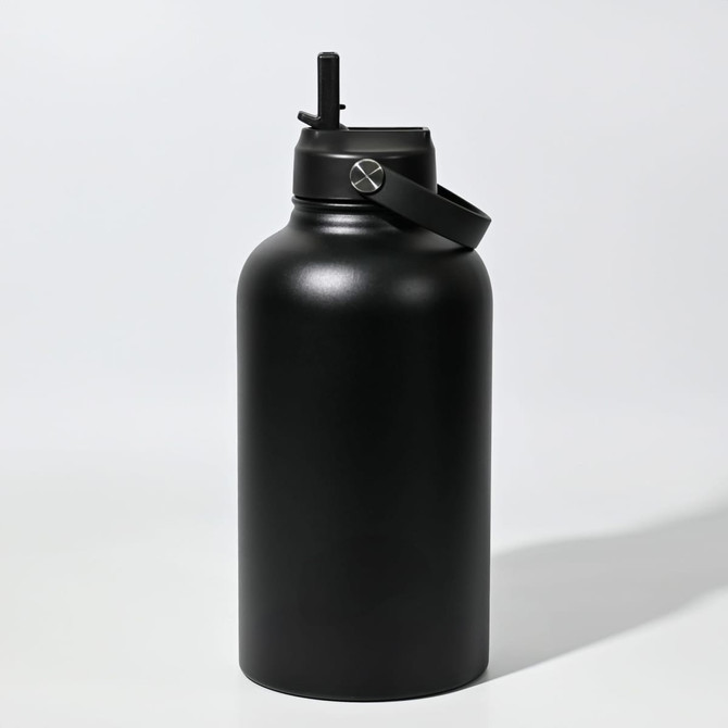 A drink bottle in matte black finish, featuring a spout and handle. It has a sleek, modern design.