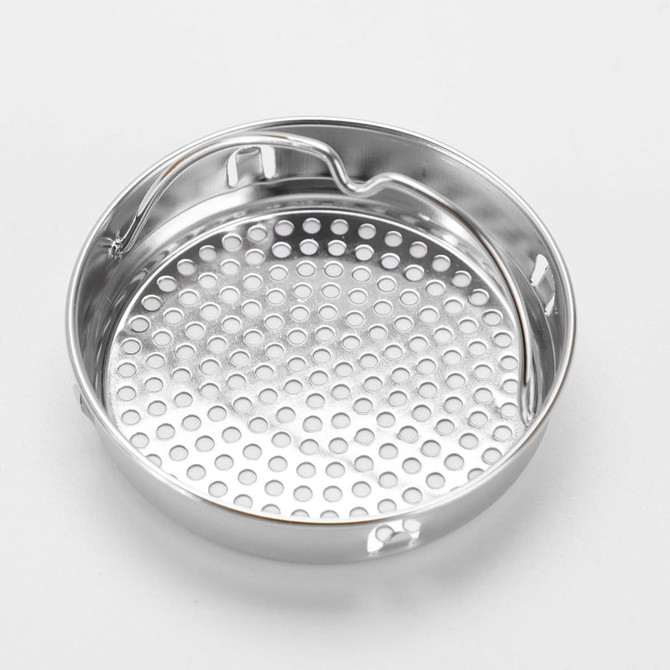 A stainless steel round tray with perforated holes, featuring a small handle on the side.