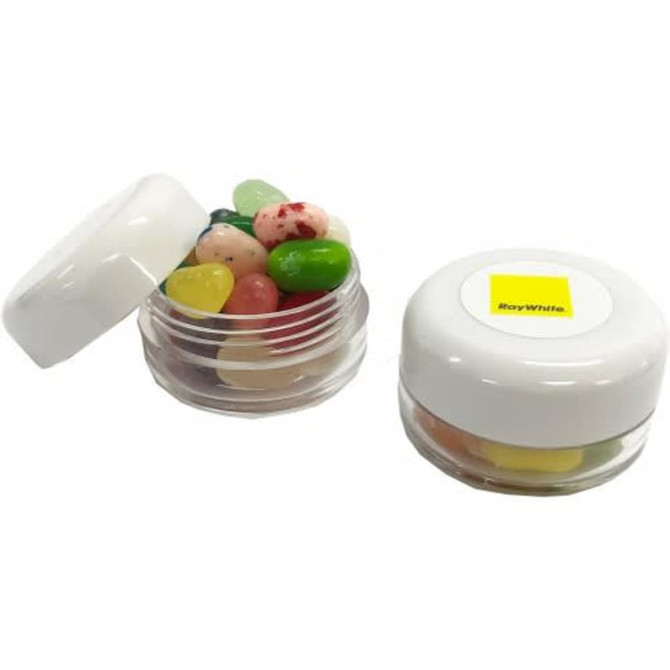 A small clear jar with a white screw cap containing a variety of colourful JELLY BELLY jelly beans.