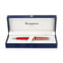 A metal ballpoint pen in comet red, presented in a navy blue box with a soft interior and a branding logo.