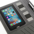 A black executive tech portfolio featuring a tablet insert and elastic pockets for cards. Includes a pen.