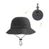 A foldable bucket hat in dark grey, featuring a logo and a toggle chin strap for adjustable fit.