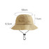 A foldable bucket hat in tan with dimensions of 58cm wide and 11cm high, featuring an adjustable chin strap.