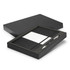A black gift box containing a dark grey notebook and a silver pen. The notebook includes a section for notes.