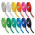 Twelve rolls of personalised ribbon in various colours, including white, yellow, pink, red, green, and blue, with a logo.