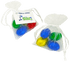 Organza bags containing four mini solid Easter eggs in blue, green, and gold. Each bag is tied with a white ribbon.