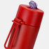 A drink bottle in vibrant red, featuring a flip-top lid and a handle for easy carrying. Includes a logo.