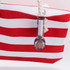 A red and white striped tote bag with a transparent cooling fan attached. The bag has rope handles.