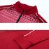 A red Polyester Spandex jacket featuring a stand-up collar and quarter-zip, with spliced raglan sleeves and a textured design.