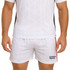 Breathable white soccer shorts with a lining, featuring black accents and a logo on the side.