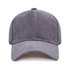 A grey corduroy baseball cap featuring a structured crown and a curved brim. It has a logo on the front.