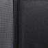 A close-up of textured fabric in dark grey and black, showcasing a layered design.