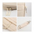 A beige laptop bag with a buffer pad, featuring zippers, a strap, and a branding logo.