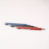 A set of three pens in blue, black, and red, featuring silver accents and clips. The pens are arranged in a row against a white background.