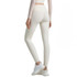 High-waisted elastic LYCRA yoga leggings in a light cream colour, featuring a logo on the waistband.