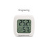 A mini digital thermometer and hygrometer in white, displaying temperature and humidity readings. It features a logo.