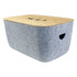 Ava Tub in grey felt with a wooden lid, featuring a cut-out handle for easy lifting.