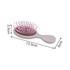 A mini paddle brush in soft pink and grey, featuring a rounded handle and flexible bristles.