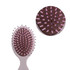 A mini paddle brush featuring a light grey handle and a brown bristle surface with pink accents.