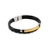 A personalised leather bracelet featuring a black band with a gold metal plate and silver accents.