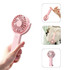 A pink handheld fan with a 180° adjustable angle, featuring a logo and a clip for easy attachment.