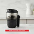 A double wall coffee mug in black with a sleek design, featuring a handle and a logo. More colours available.