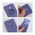 A purple PU magnetic card and AirTag holder with a hand inserting a card into the sleeve. Features a metal button.