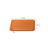An orange PU magnetic phone card holder with dimensions of 9.5 cm by 6.5 cm and a thickness of 1 cm.