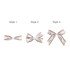 Three hair clip bows in white and brown patterns, featuring different styles with varying ribbon arrangements.