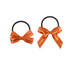 Two elastic hair bows in chocolate brown with orange ribbons featuring the words "Forward" and "Chocolate".