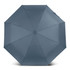 A compact umbrella in a solid slate grey colour with a central button and a sleek design. It features a logo.