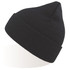 A black beanie with a ribbed texture and a tapered top, featuring a logo on the side.
