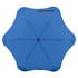 A blue BLUNT Metro Umbrella with a unique octagonal shape and a central black button, featuring branding.