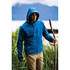 A blue men's jacket with a hood, featuring zippered pockets, worn by a person holding a stick outdoors.