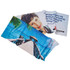 A sublimation sports towel with a vibrant beach scene and a person’s image, featuring blue and white colours.