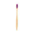 A bamboo toothbrush with a natural wooden handle and purple bristles. It features a logo on the handle.